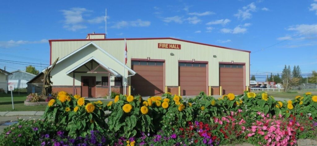 Pouce Coupe Fire Hall with Flowers
